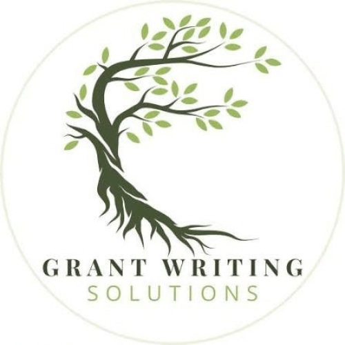 Grant Writing Solutions logo with tree illustration